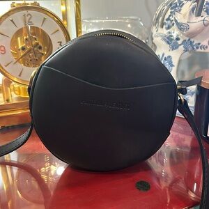 Portland leather small “almost perfect circle” crossbody